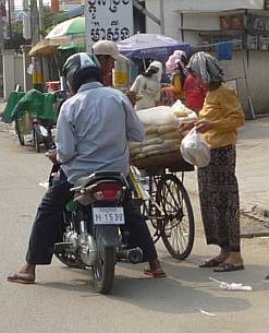 Selling corn from a bicycle